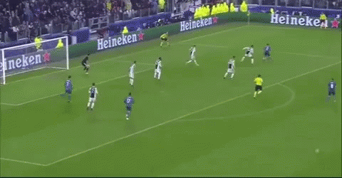A Soccer Game Is Being Played On A Field With An Ad For Unicredit GIF