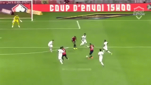 A Soccer Game Is Being Played On A Field With An Advertisement For Losc.fr In The Background GIF