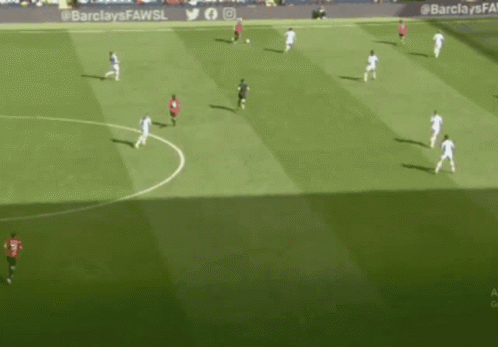 A Soccer Game Is Being Played On A Field With Barclays Fawsl Written On The Sidelines GIF