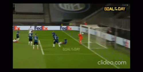 A Soccer Game Is Being Played On A Field With Fedex Advertisements In The Background GIF