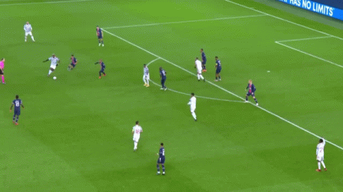 A Soccer Game Is Being Played On A Field With Ps5 Advertisements In The Background GIF