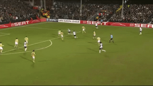 A Soccer Game Is Being Played On A Field With Seat Advertisements On The Sidelines GIF