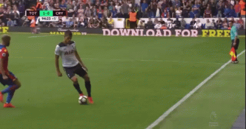 A Soccer Game Is Being Played On A Green Field GIF