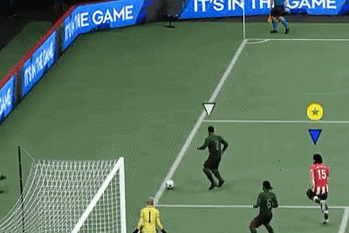 A Soccer Game Is Being Played On A Soccer Field . GIF