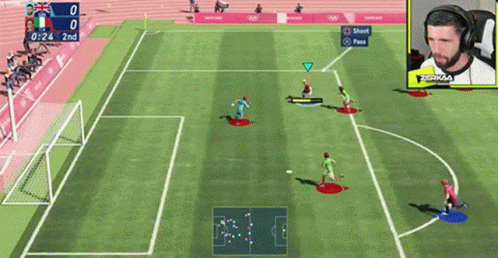 A Soccer Game Is Being Played On A Video Game With A Man Wearing Headphones In The Background . GIF