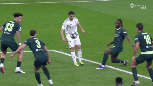 A Soccer Game Is Being Played On Tnt Sports GIF