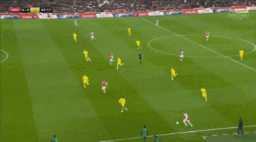 a soccer game is being played with the score 0-0