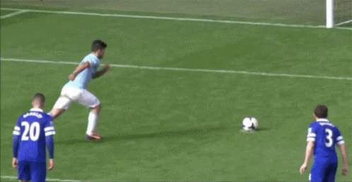 A Soccer Goalie Is Diving To Catch A Soccer Ball In The Goal GIF