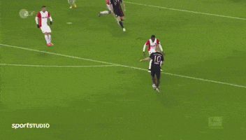 a soccer goalie is kneeling on the field in front of a sign that says " von segmu "