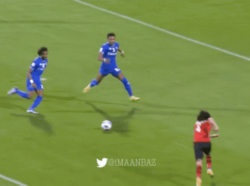 a soccer goalie is laying on the ground in front of a goal with a twitter logo in the corner
