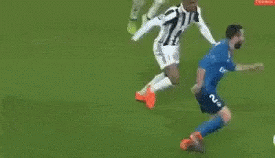 A Soccer Goalie Is Standing In Front Of A Coca Cola Sign GIF