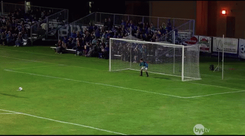A Soccer Goalie Stands In Front Of A Net With A Byu Tv Logo In The Corner GIF