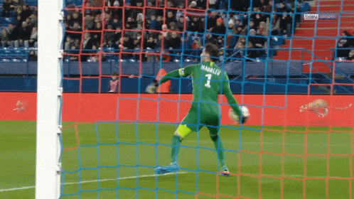 A Soccer Goalie With The Number 1 On His Back GIF