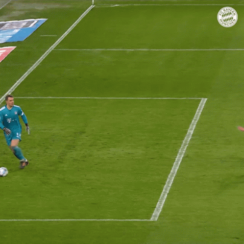 a soccer goalie with the number 3 on his jersey stands on the field