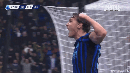 a soccer player celebrates a goal during a match