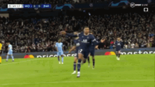 A Soccer Player Celebrates A Goal With His Teammates GIF