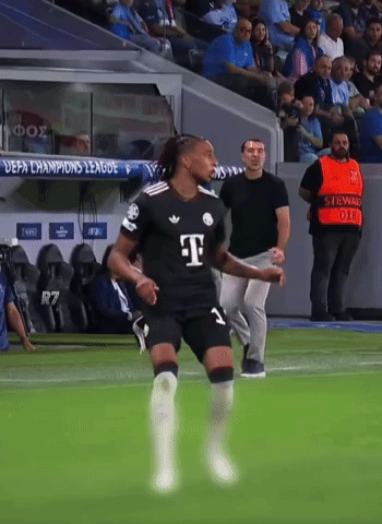 A Soccer Player In A Black T-Mobile Jersey Runs On The Field GIF