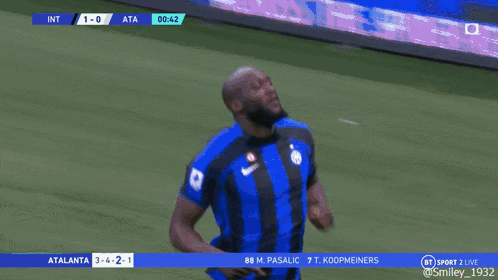 A Soccer Player In A Blue And Black Jersey With The Number 90 On It GIF