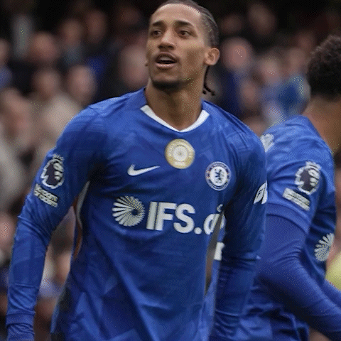 A Soccer Player In A Blue Ifs Jersey Stands In Front Of A Crowd GIF