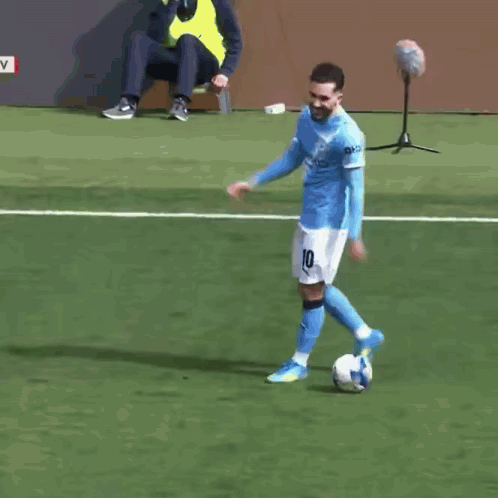 A Soccer Player In A Blue Jersey With The Number 22 On The Back GIF