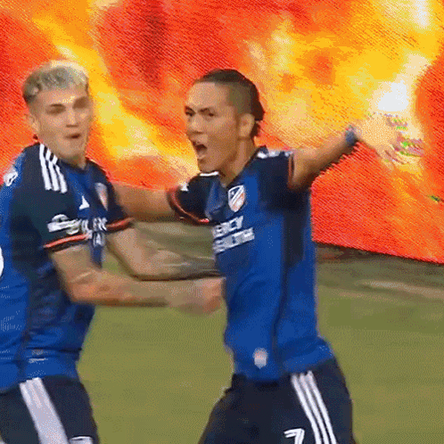 A Soccer Player In A Blue Jersey With The Number 7 On The Back GIF