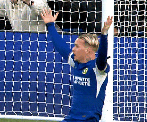 A Soccer Player In A Blue Jersey With The Word Infinite Athlete On It GIF