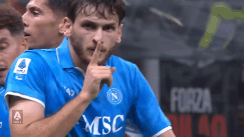 A Soccer Player In A Blue Msc Jersey Holds His Finger To His Lips GIF
