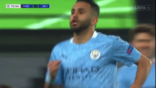 A Soccer Player In A Blue Shirt Is Celebrating A Goal GIF