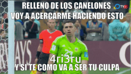 A Soccer Player In A Green Jersey Stands In Front Of A Soccer Goal GIF