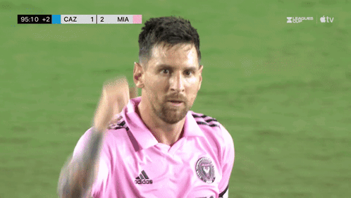 A Soccer Player In A Pink Shirt Looks At The Scoreboard Which Says Caz 1 2 Mia GIF