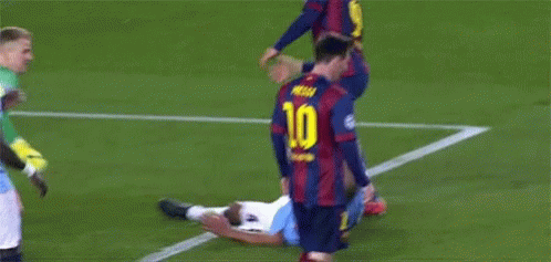 A Soccer Player In A Purple And Blue Jersey With The Number 10 On It GIF