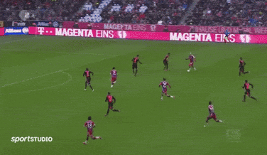 a soccer player in a red and blue jersey with the year 2014/15 on the bottom
