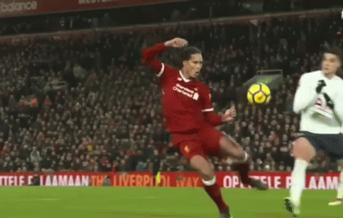 A Soccer Player In A Red Jersey With Liverpool On It GIF