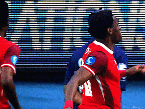 A Soccer Player In A Red Jersey With The Number 21 On The Back GIF