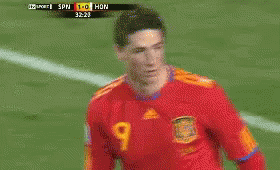 A Soccer Player In A Red Jersey With The Number 9 On It GIF