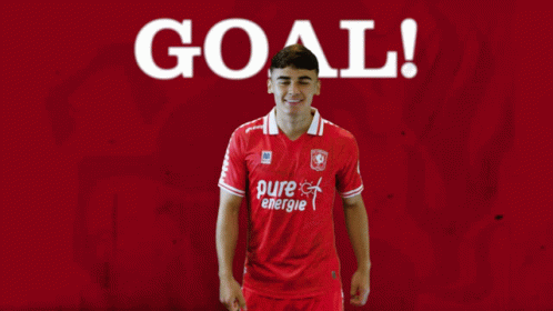 A Soccer Player In A Red Shirt With Pure Energie On It GIF