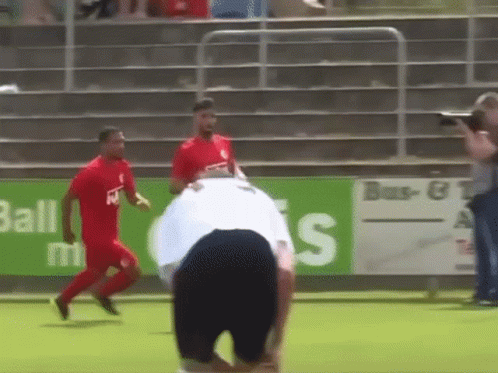 A Soccer Player In A Red Shirt With The Letter W On It GIF