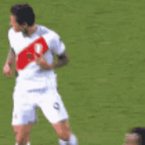 A Soccer Player In A White Jersey With A Red Stripe On The Back GIF