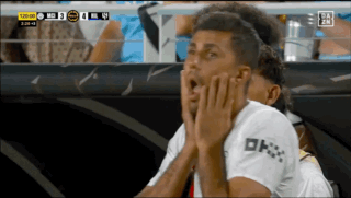 A Soccer Player In A White Shirt With Ok On The Sleeve GIF