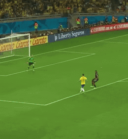 a soccer player in a yellow jersey with the number 11 on it