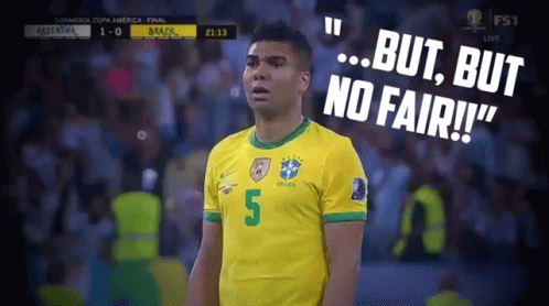 A Soccer Player In A Yellow Shirt With The Number 5 On It Is Standing On The Field . GIF