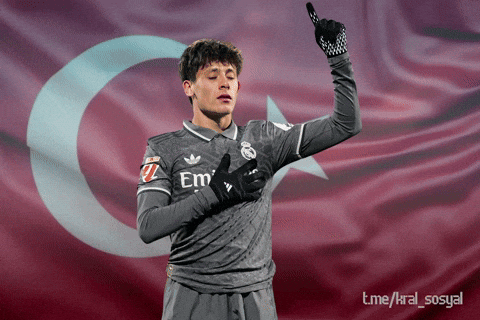 A Soccer Player In Front Of A Flag That Says Em GIF