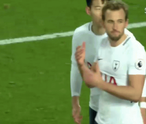 A Soccer Player Is Giving A Thumbs Up Sign While Standing On A Field . GIF