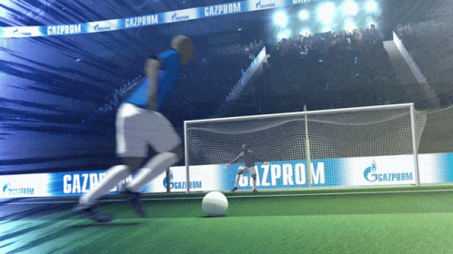 A Soccer Player Is Kicking A Ball On A Field With Gazprom Banners Behind Him GIF