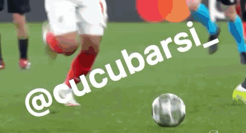 A Soccer Player Is Kicking A Ball On A Field With The Words @Cucubarsi_ On It GIF