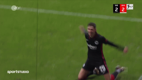 A Soccer Player Is Kneeling On The Field With A Score Of 2 To 2 GIF