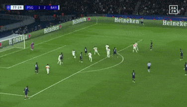 a soccer player is laying on the field during a game between psg and bay ..