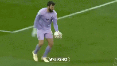 A Soccer Player Is Laying On The Ground With A Twitter Logo In The Corner . GIF