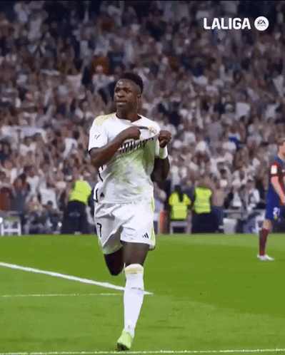 A Soccer Player Is Running On A Field With A Laliga Logo In The Background GIF