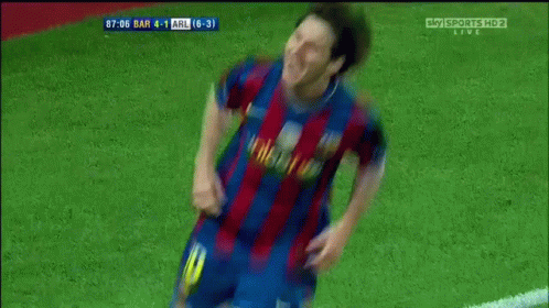 a soccer player is running on a field with a scoreboard that says sky sports hd 2 live on it